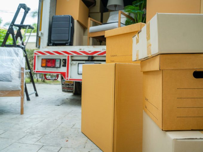 House moving service,Boxes waiting to be moved into a new home.